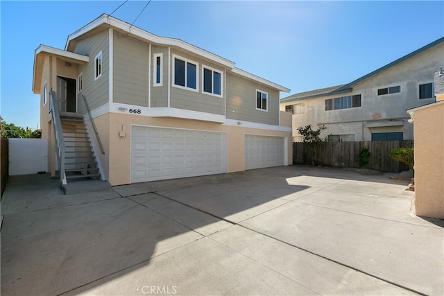 view of front of property with a garage