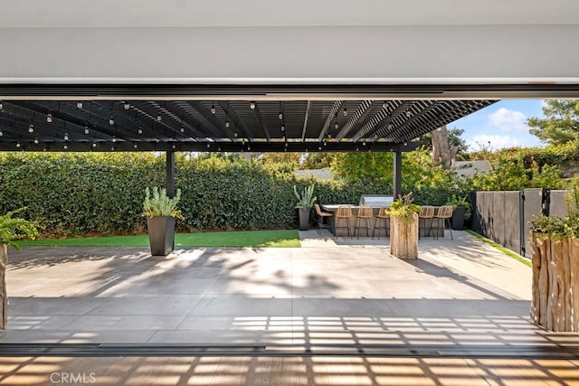 view of patio / terrace with an outdoor bar