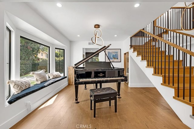 miscellaneous room with light hardwood / wood-style floors