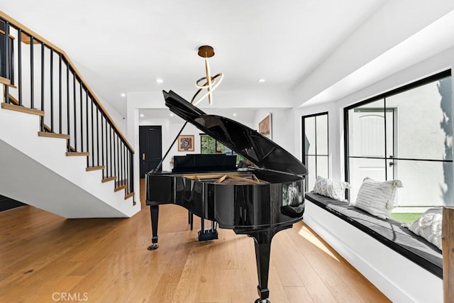 miscellaneous room with hardwood / wood-style flooring