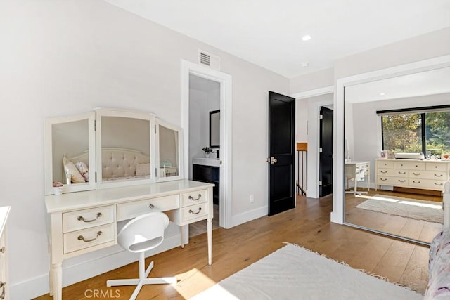 bedroom featuring light wood-type flooring