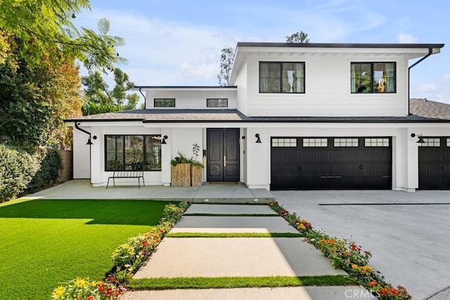 modern inspired farmhouse with a front lawn, a porch, and a garage