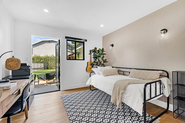 bedroom with light hardwood / wood-style floors