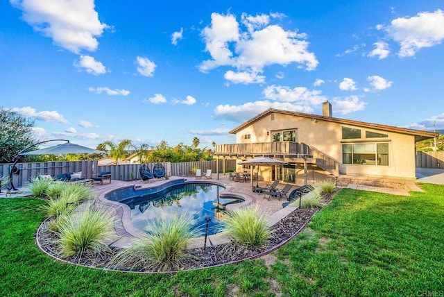 view of pool featuring a yard and a patio