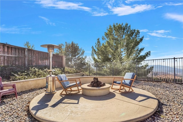 view of patio / terrace featuring a fire pit