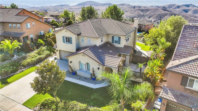 bird's eye view with a mountain view