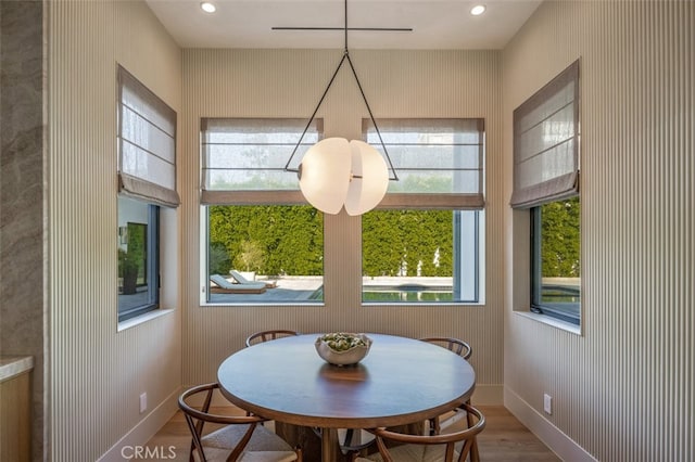 dining room featuring wood-type flooring