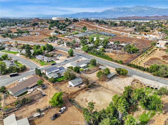 drone / aerial view featuring a mountain view