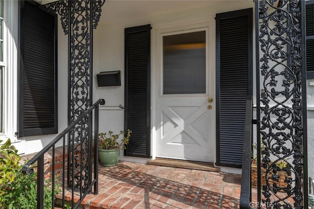 entrance to property with a porch