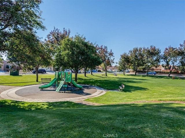 view of jungle gym with a yard