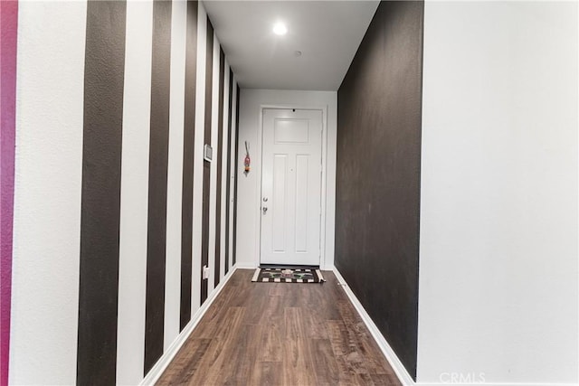 hallway featuring hardwood / wood-style floors