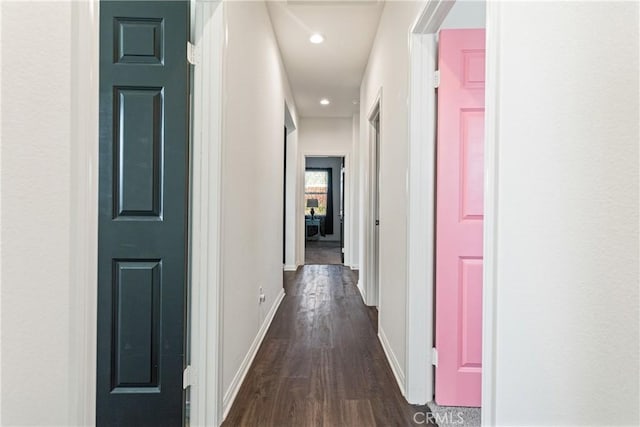 hall with dark hardwood / wood-style floors