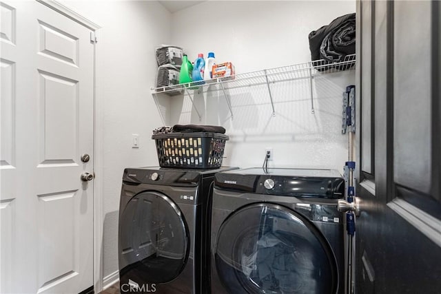 laundry area featuring washing machine and dryer