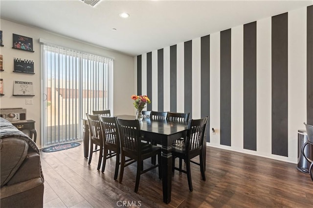 dining area featuring wood-type flooring