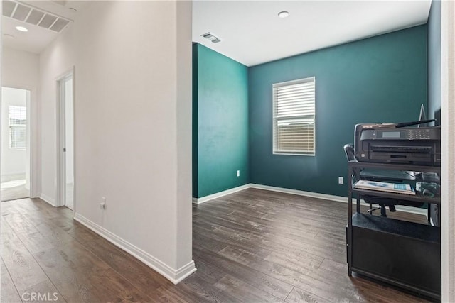 misc room with dark hardwood / wood-style flooring