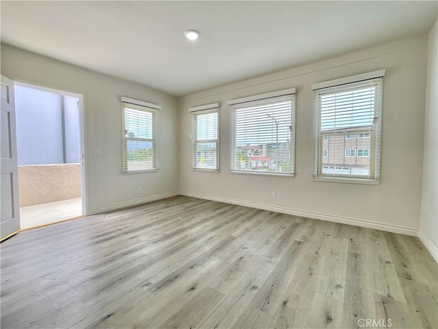 empty room featuring light wood-type flooring