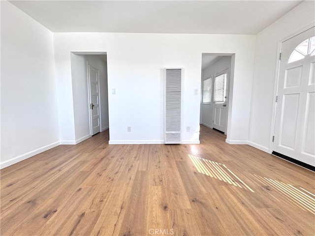 empty room with light wood-type flooring