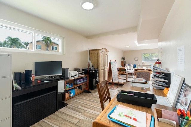 office area with light hardwood / wood-style floors