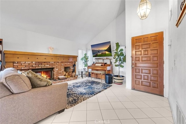 tiled living room with a fireplace and high vaulted ceiling