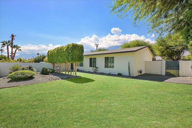 exterior space with a front lawn