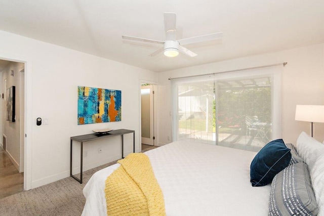 bedroom featuring ceiling fan and access to exterior