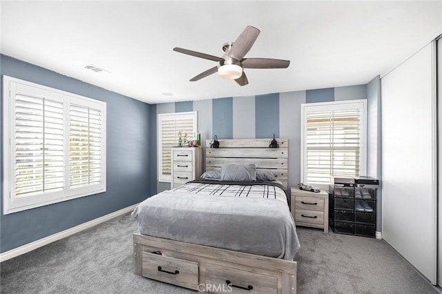 carpeted bedroom featuring ceiling fan