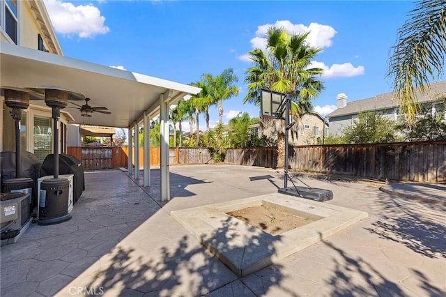 view of patio / terrace featuring ceiling fan