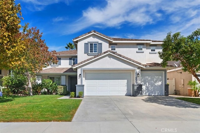 view of front property featuring a garage and a front yard