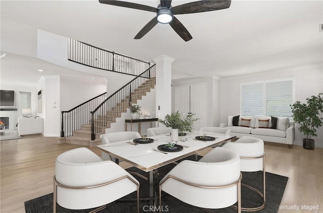 dining area featuring ceiling fan and hardwood / wood-style flooring