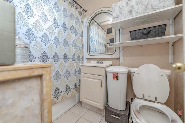 full bathroom with tile patterned flooring, bathtub / shower combination, vanity, and toilet