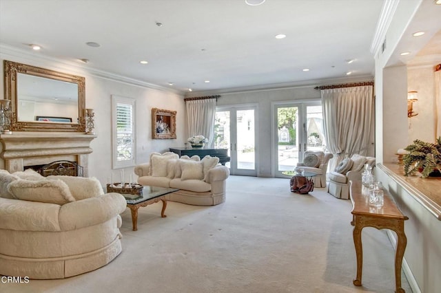 living room with a wealth of natural light, carpet floors, and ornamental molding