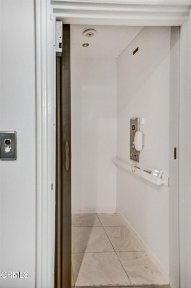 bathroom featuring tile patterned flooring