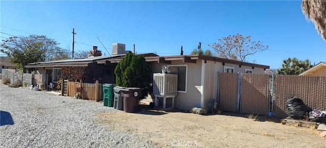 view of home's exterior featuring central AC unit