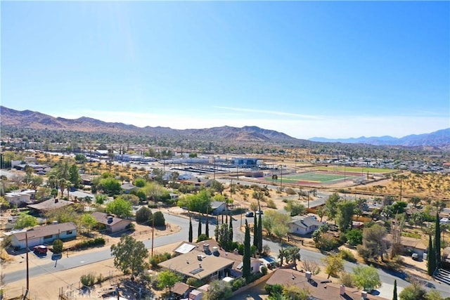 bird's eye view with a mountain view