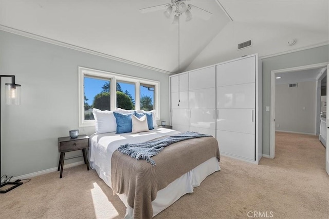 carpeted bedroom with ceiling fan and lofted ceiling