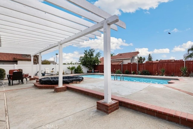 view of pool with a patio area and a pergola