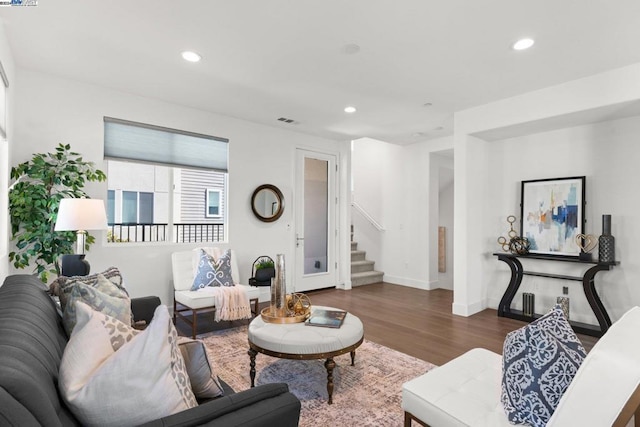 living room with dark wood-type flooring