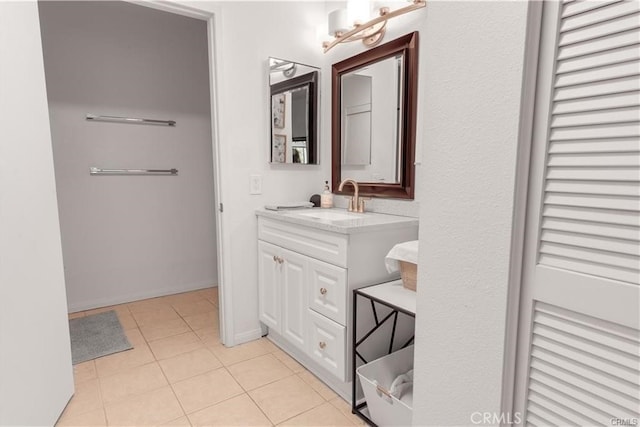 bathroom featuring vanity and tile patterned flooring