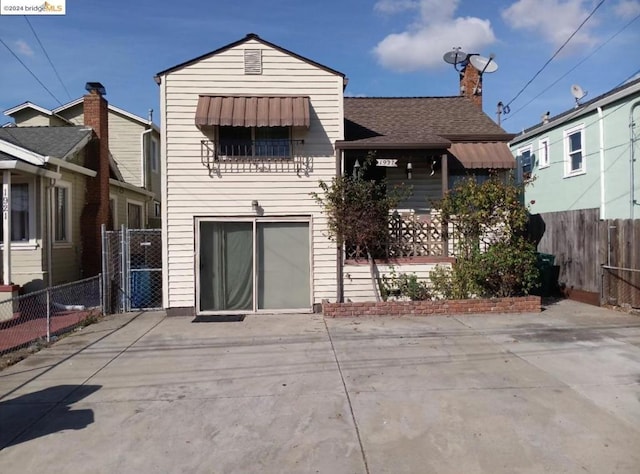 back of house with a patio area