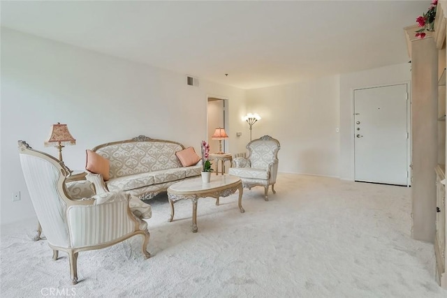 living room with light colored carpet