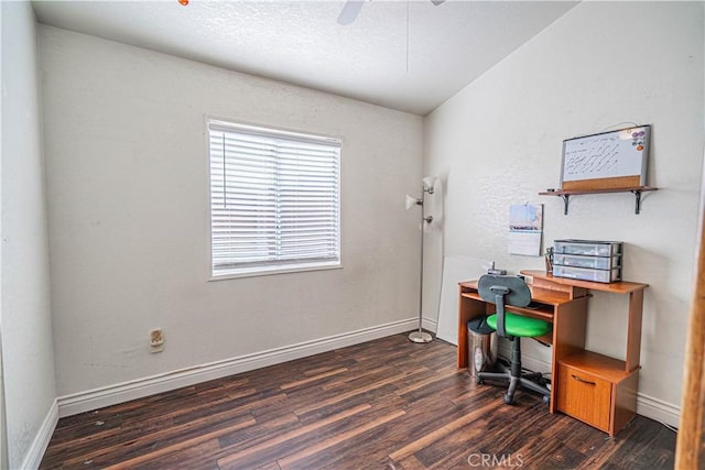 office space featuring baseboards, wood finished floors, and a ceiling fan