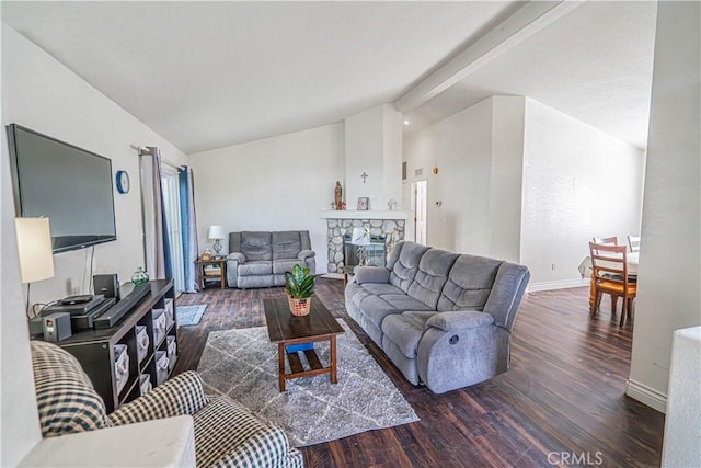 living area featuring wood finished floors, vaulted ceiling with beams, and baseboards