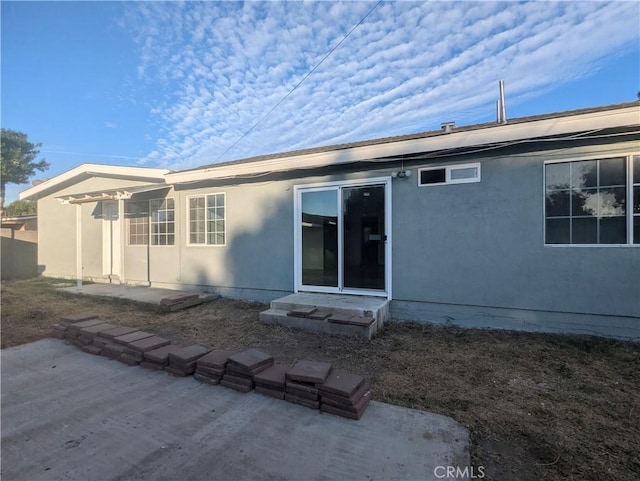 11881 Old Fashion Way, Garden Grove, CA 92840 - rear view of property featuring a patio and stucco siding