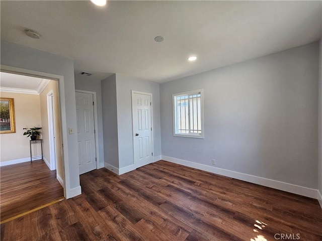 11881 Old Fashion Way, Garden Grove, CA 92840 - unfurnished bedroom with dark wood finished floors, ornamental molding, recessed lighting, and a closet