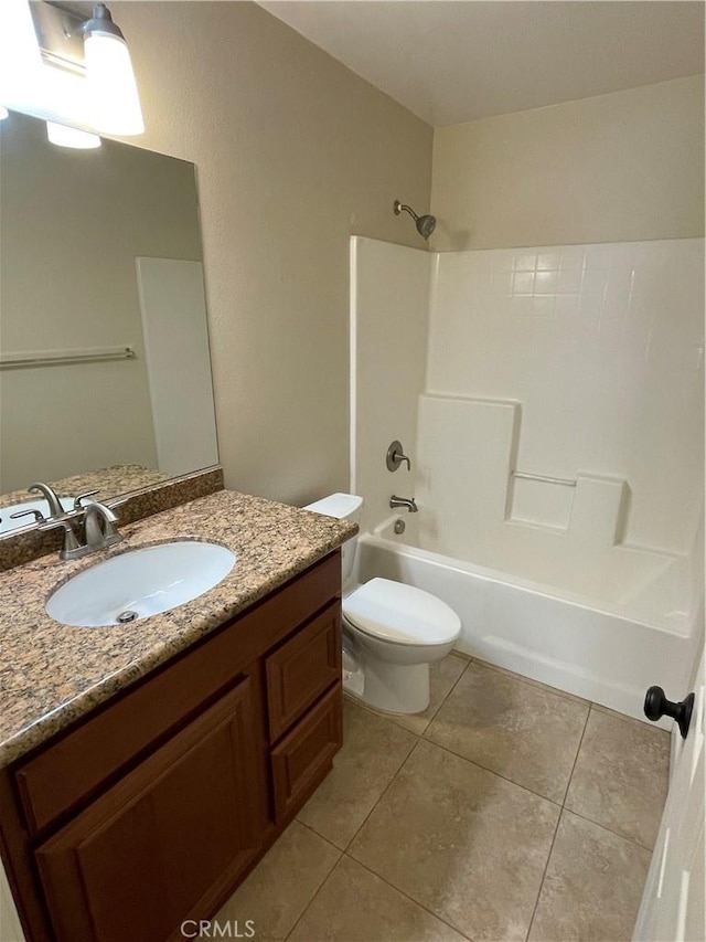 full bathroom featuring toilet, vanity, tile patterned floors, and shower / bath combination