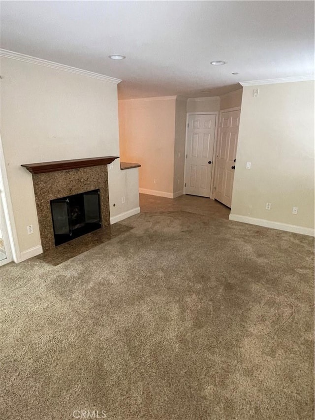 unfurnished living room with crown molding and carpet