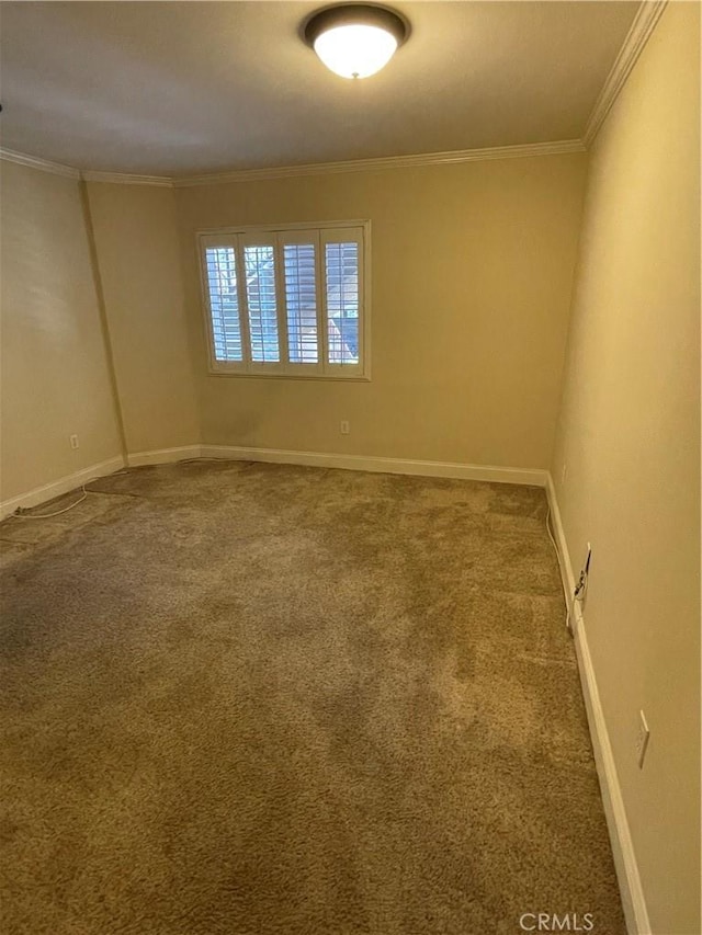 carpeted spare room with ornamental molding