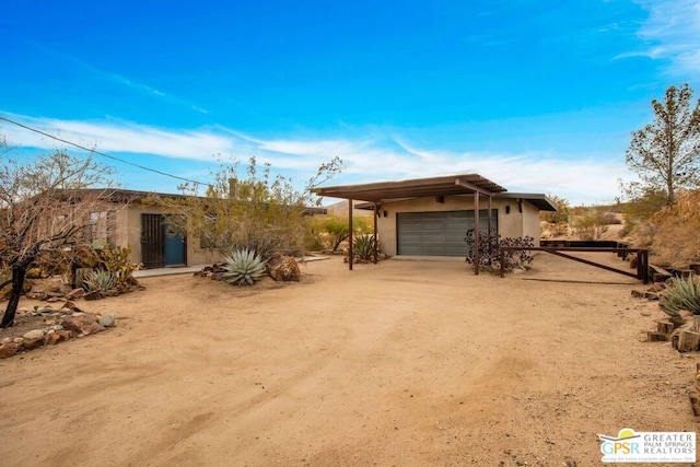 view of property exterior with a garage