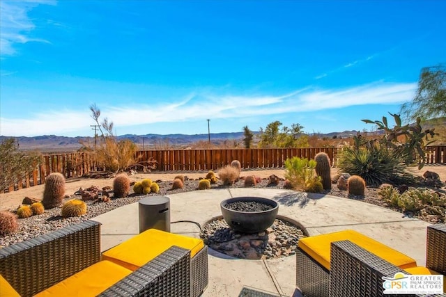 view of patio featuring a mountain view