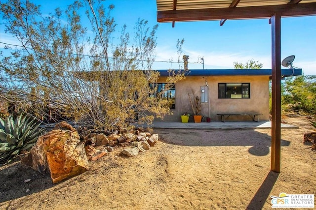 view of front of house featuring a patio